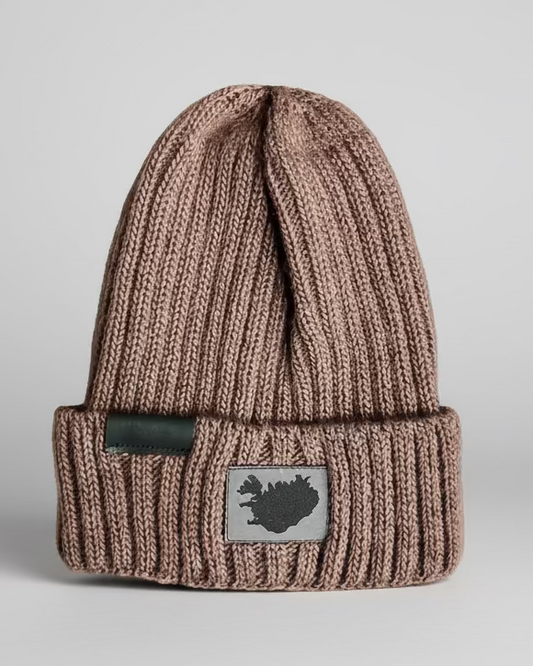 A brown beanie with a branded tag on the front showing the Reykjavik District logo on light grey backdrop

