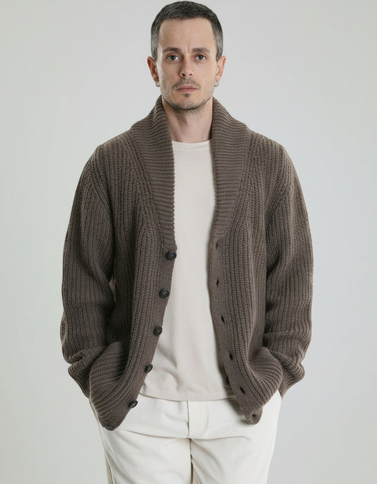 Man wearing a brown cardigan over a white shirt 